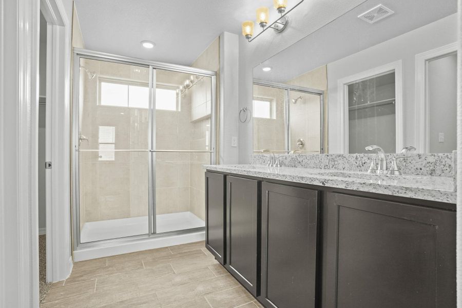 Representative furnished interior of a home built from the Blue Agave by View Homes in Paseos Del Este, Horizon City (Image 39).
