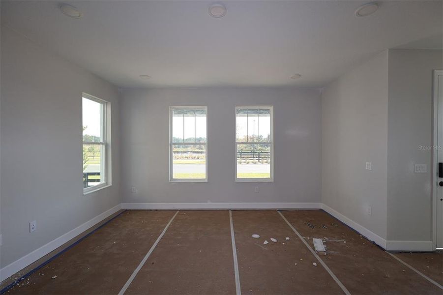 In-progress construction of a new home in Center Lake on the Park, St. Cloud, FL (Image 11).