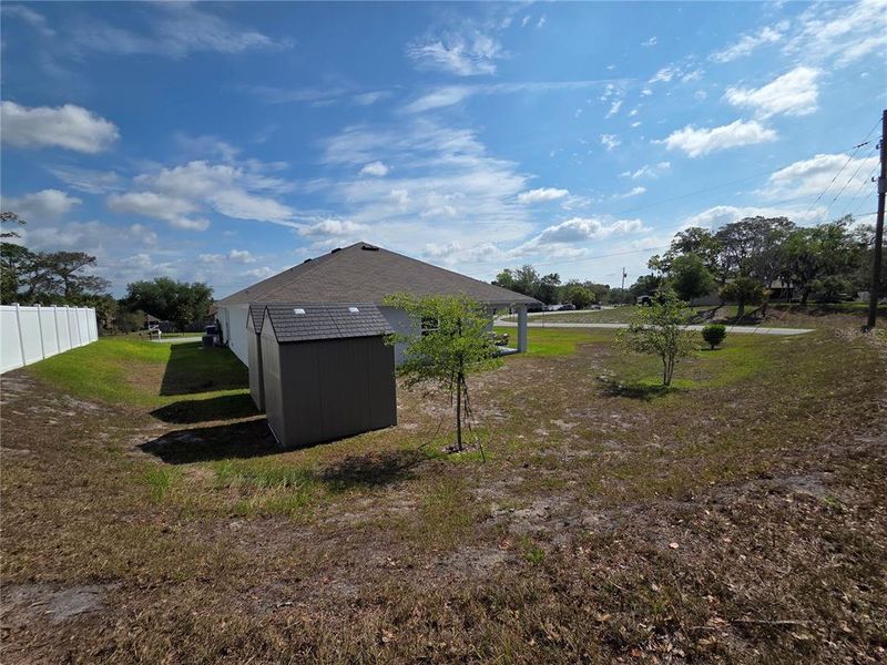 Exterior details and patio area of a home in Hernando County Spot Lots, Spring Hill (Image 27).