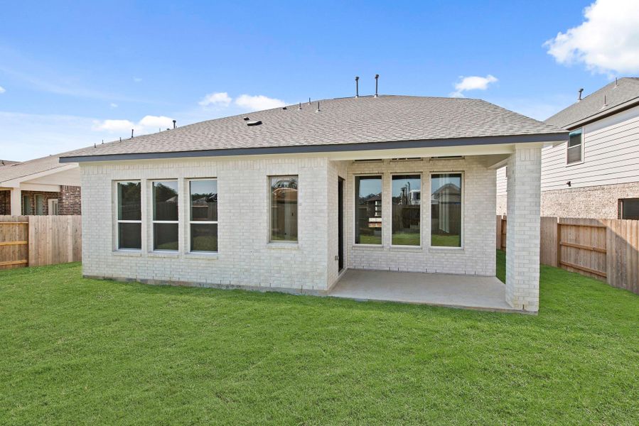 Exterior details and patio area of a home in The Trails - 45', New Caney (Image 2). Exterior details and patio area of a home in The Trails - 45', New Caney (Image 2).