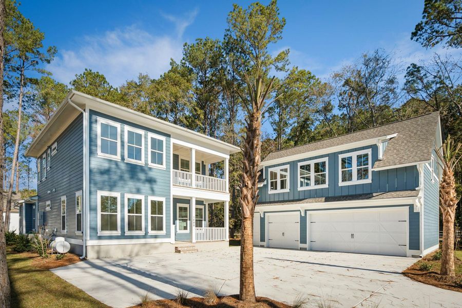 Front exterior of a new home in , Awendaw, SC, highlighting curb appeal (Image 29).