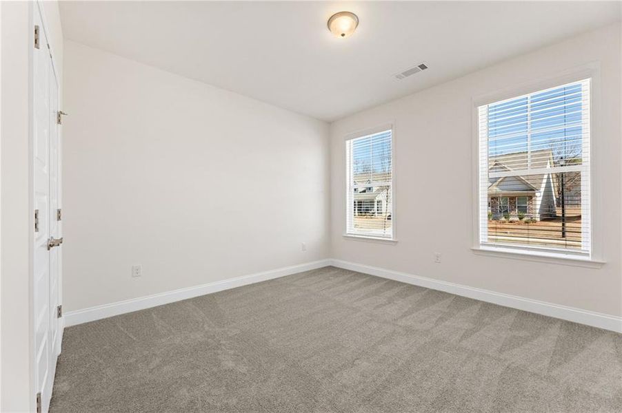 Spacious, unfurnished interior of a new home in Cooper's Walk, Loganville (Image 15).