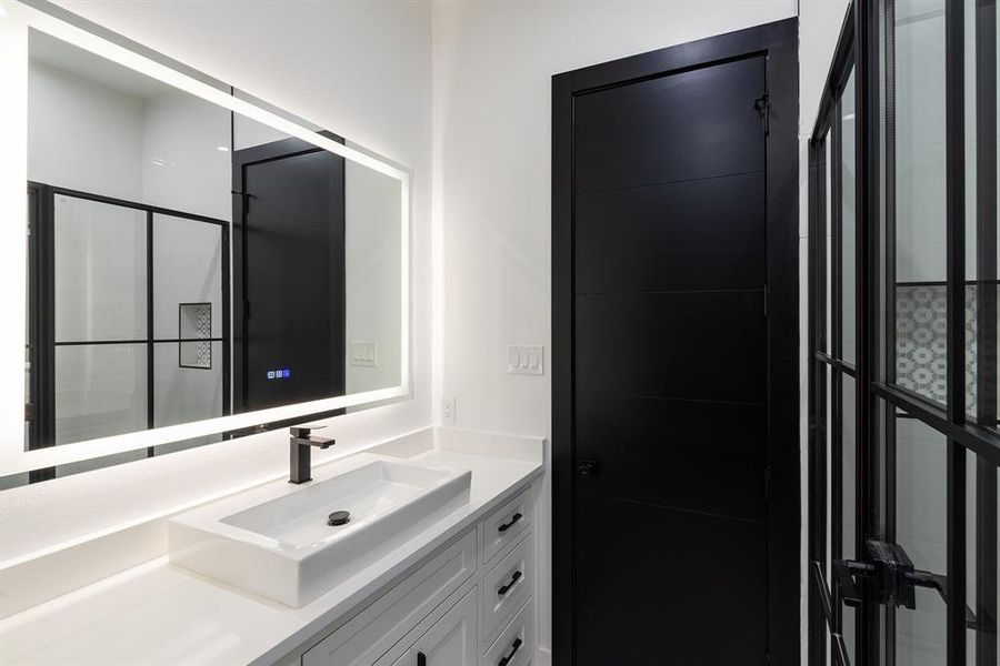 Bathroom with vanity and walk in shower