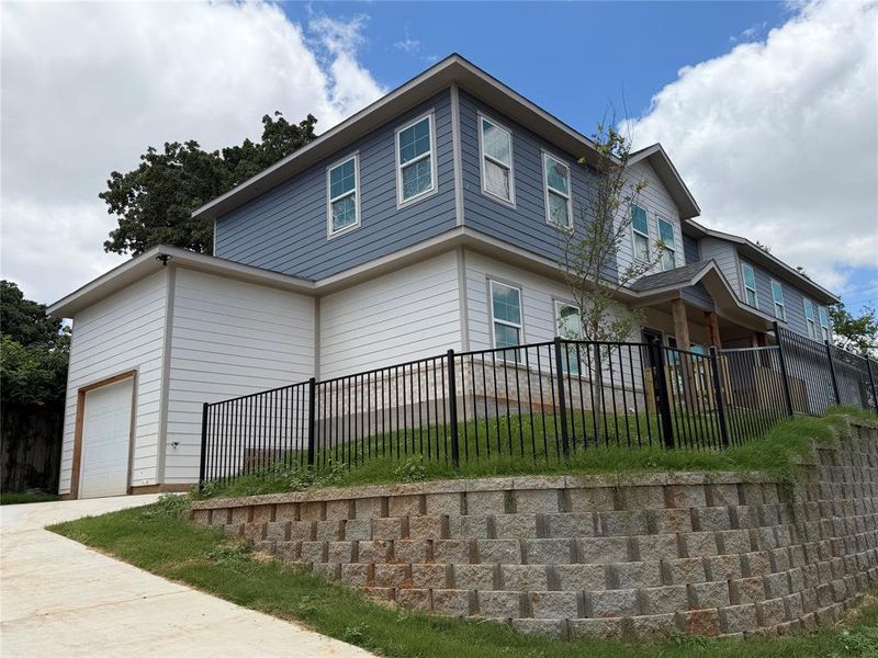 Front exterior of a new home in , Dallas, TX, highlighting curb appeal (Image 2). Front exterior of a new home in , Dallas, TX, highlighting curb appeal (Image 2).