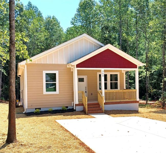 Front exterior of a new home in , Statesville, NC, highlighting curb appeal (Image 2).