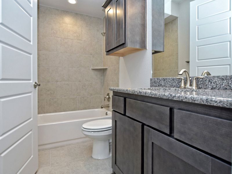Representative furnished interior of a home built from the San Simeon II by Giddens Homes in Clearwater Ranch, Liberty Hill (Image 14).
