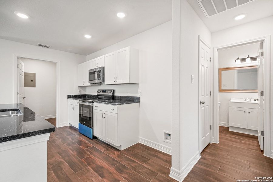 Furnished interior view inside a new home in , San Antonio (Image 13).
