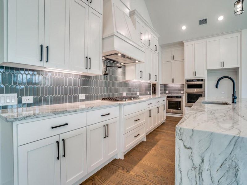 Beautiful and luxurious finishes are everywhere you looking in this over the top home!