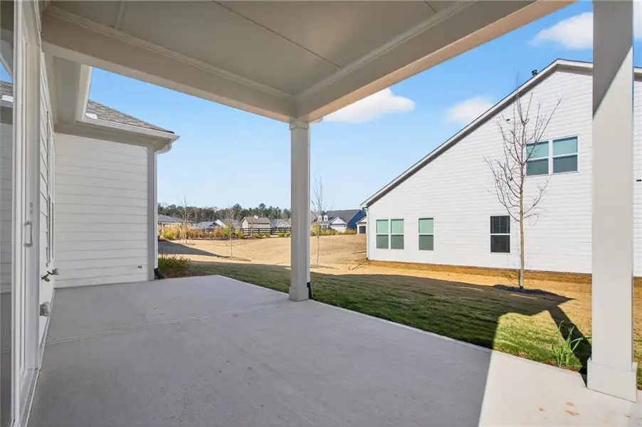 Exterior details and patio area of a home in The Reserve at Bells Ferry, Kennesaw (Image 4).