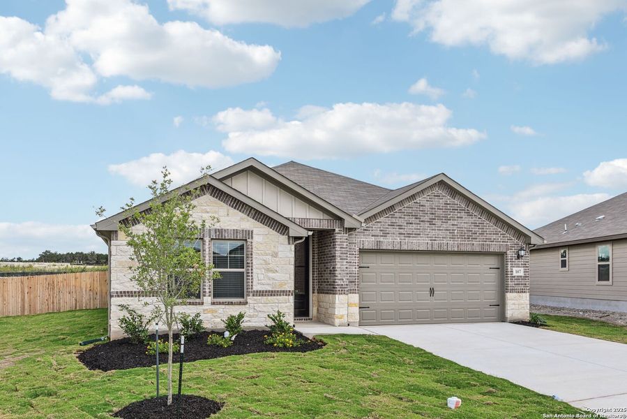 Front exterior of a new home in , Cibolo, TX, highlighting curb appeal (Image 21). Front exterior of a new home in , Cibolo, TX, highlighting curb appeal (Image 21).