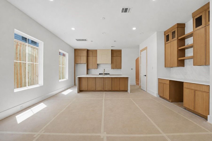 Open concept living, dining and kitchen area Open concept living, dining and kitchen area