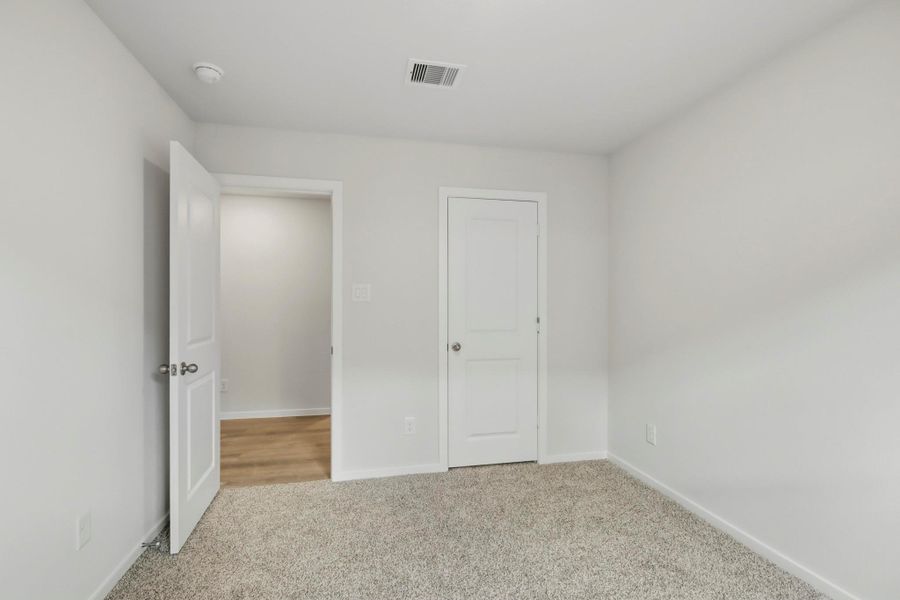 Spacious, unfurnished interior of a new home in New Waverly Station, New Waverly (Image 21). Spacious, unfurnished interior of a new home in New Waverly Station, New Waverly (Image 21).