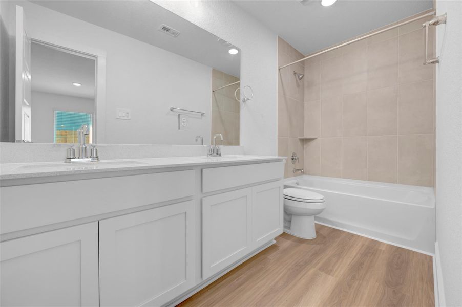 Furnished interior view inside a new home in Lone Star Landing, Montgomery (Image 12).