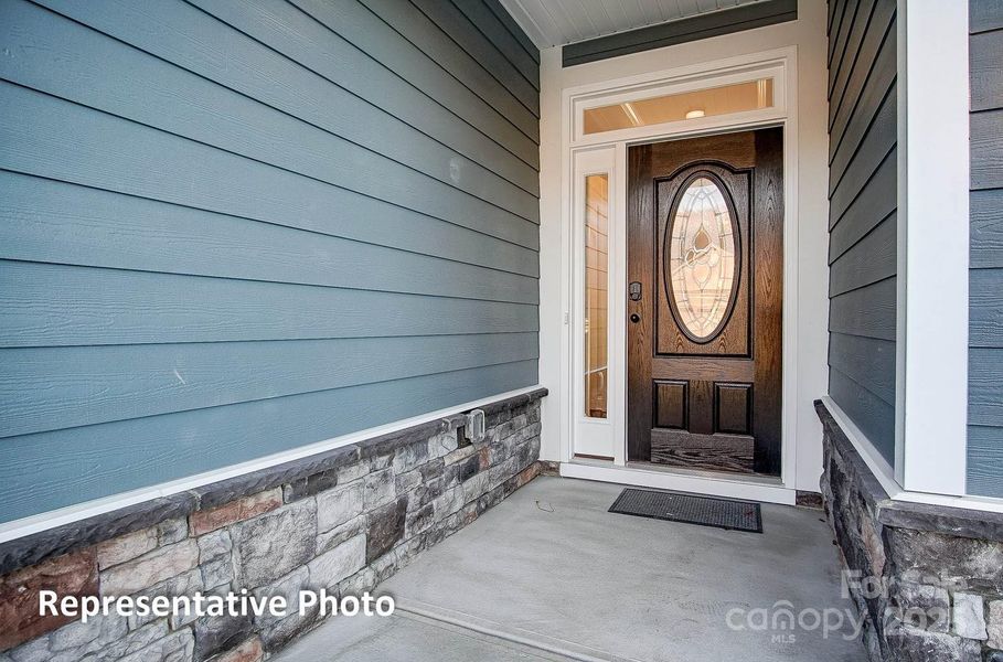 Exterior details and patio area of a home in Villas at Prestwick, Mooresville (Image 3).