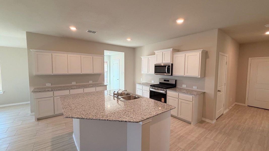 Furnished interior view inside a new home in Rosewood at Beltmill, Fort Worth (Image 5).