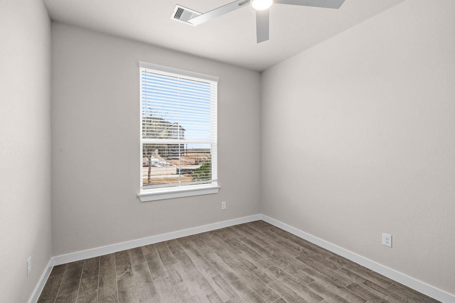 Spacious, unfurnished interior of a new home in Sunterra Lakes, Fulshear (Image 28).