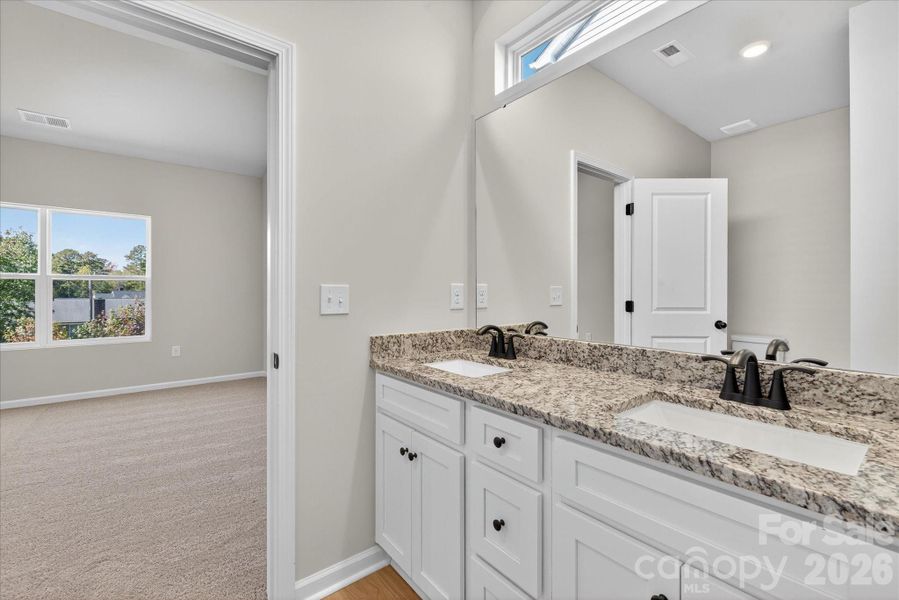 Furnished interior view inside a new home in Stagecoach Station, Gastonia (Image 6).