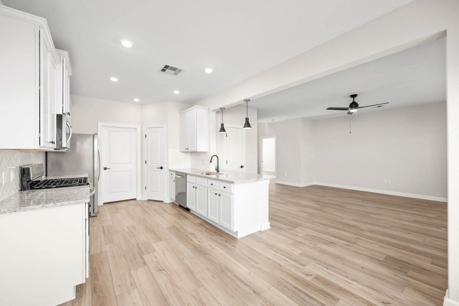 Furnished interior view inside a new home in Sunterra, Katy (Image 7).