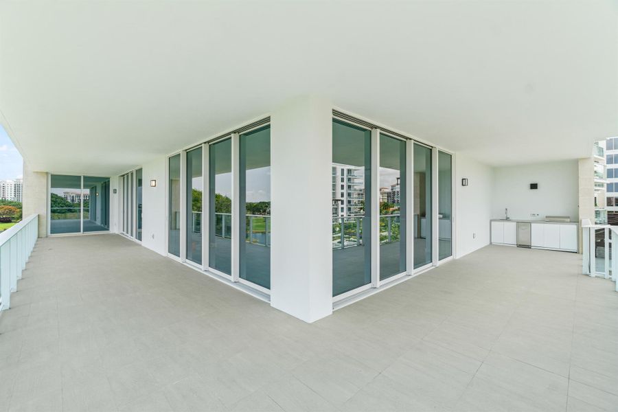 Exterior details and patio area of a home in Alina Residences, Boca Raton (Image 18).