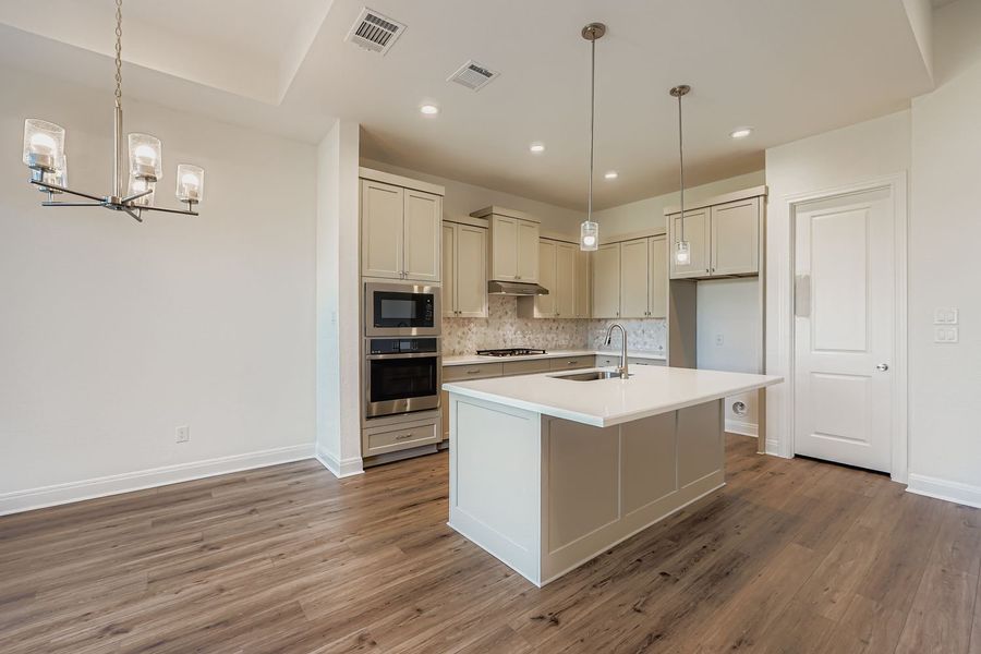 Furnished interior view inside a new home in 6 Creeks, Kyle (Image 3). Furnished interior view inside a new home in 6 Creeks, Kyle (Image 3).
