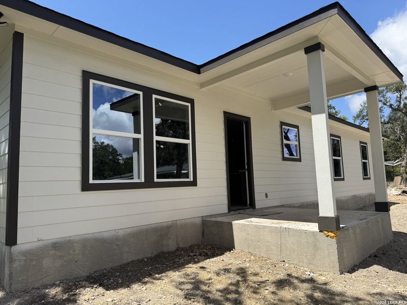 Exterior details and patio area of a home in , Spring Branch (Image 20).