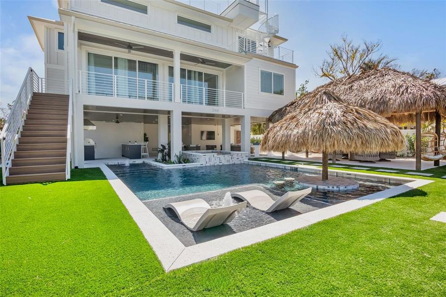 Front exterior of a new home in , Anna Maria, FL, highlighting curb appeal (Image 23).