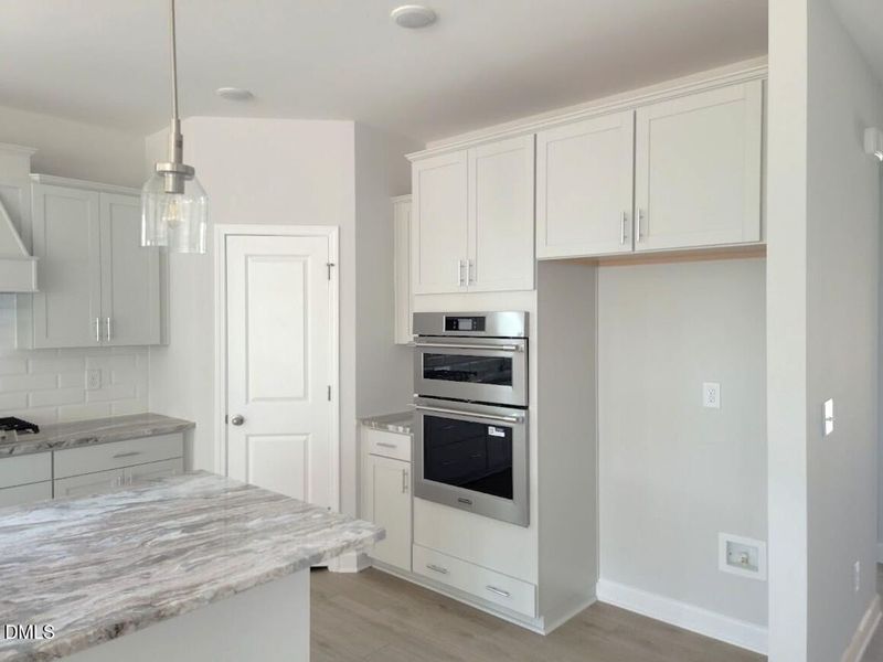 Furnished interior view inside a new home in Tobacco Road, Angier (Image 3).
