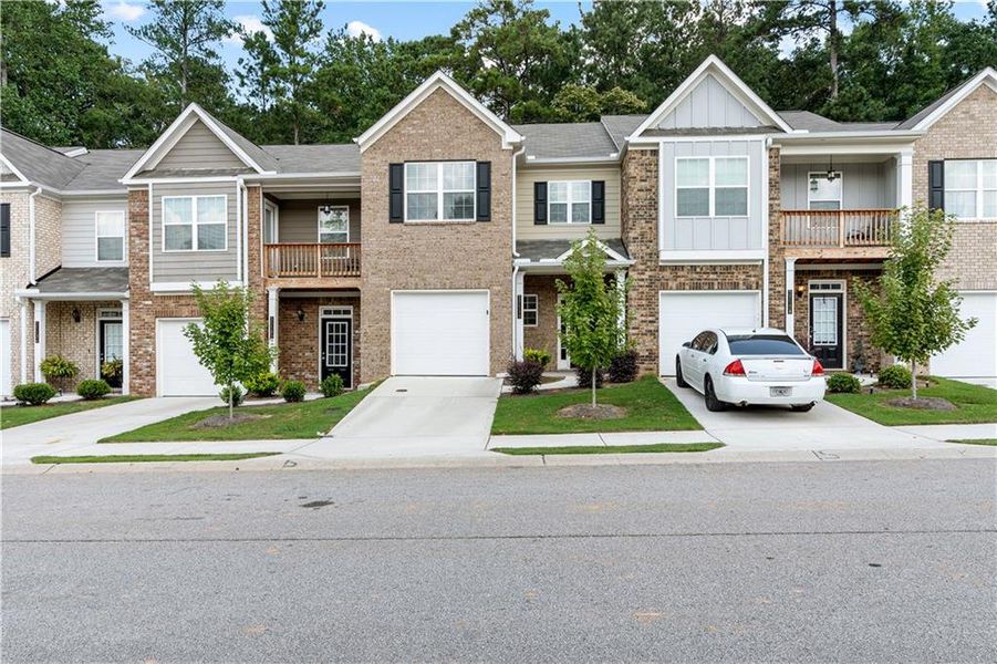 Front exterior of a new home in , Covington, GA, highlighting curb appeal (Image 26).