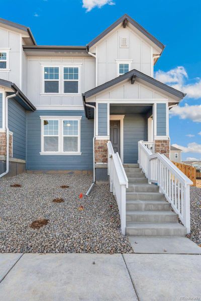 Exterior details and patio area of a home in Turnberry, Commerce City (Image 23).