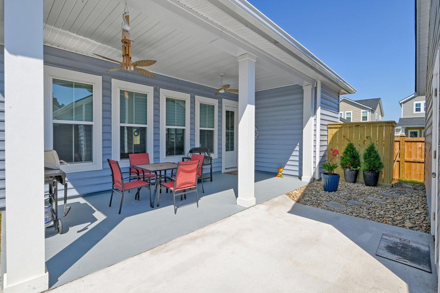 Exterior details and patio area of a home in Heron's Walk at Summers Corner, Summerville (Image 26).
