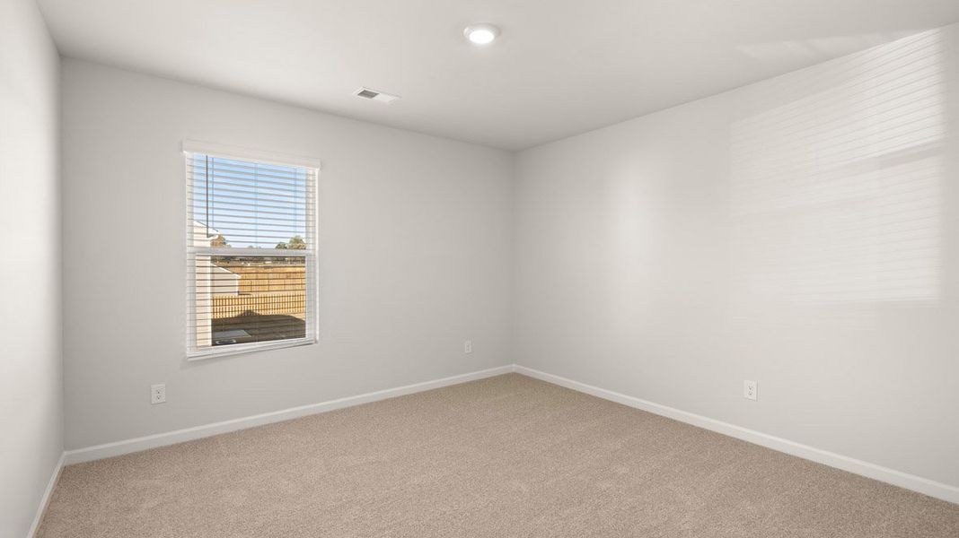 Spacious, unfurnished interior of a new home in Southwind Village, Evans (Image 40).