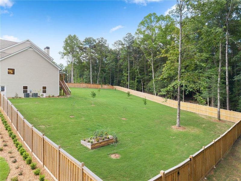 Exterior details and patio area of a home in Woodland Hills, Loganville (Image 35). Exterior details and patio area of a home in Woodland Hills, Loganville (Image 35).