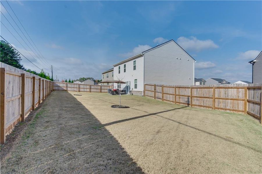 Exterior details and patio area of a home in The Reserve at Calcutta, Stockbridge (Image 26).