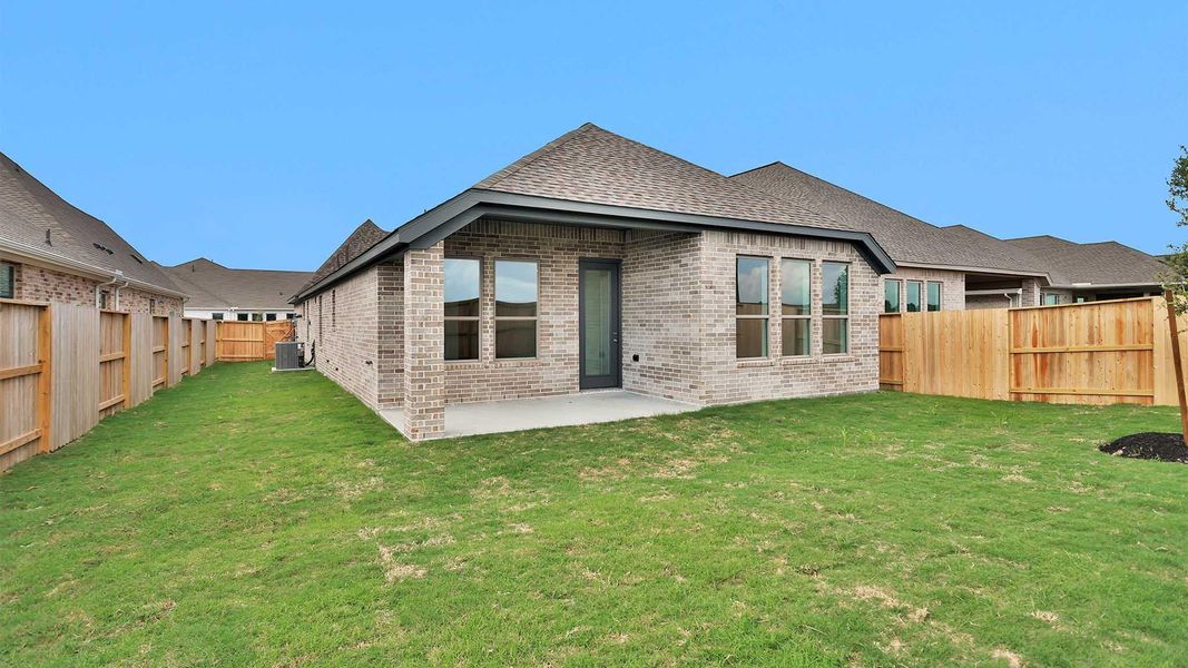 Exterior details and patio area of a home in Meridiana, Manvel (Image 3).