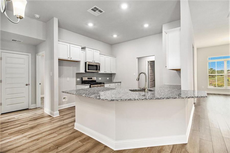 Kitchen with Breakfast Bar Area