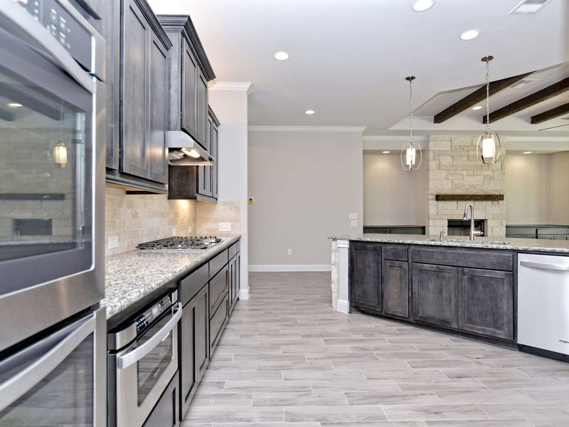 Representative furnished interior of a home built from the San Simeon I by Giddens Homes in Clearwater Ranch, Liberty Hill (Image 277).