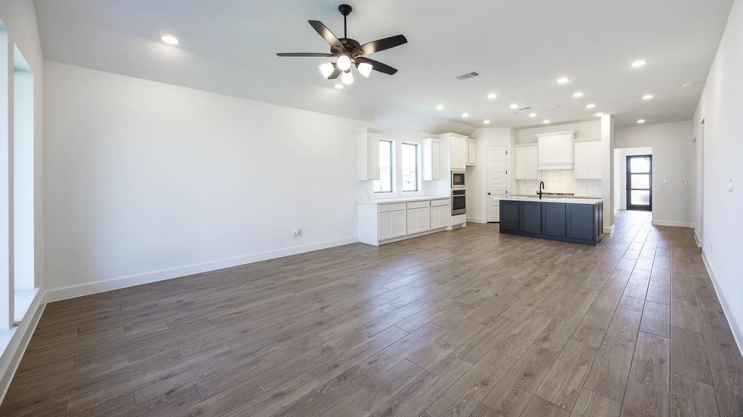 Spacious, unfurnished interior of a new home in Lariat 45', Liberty Hill (Image 7). Spacious, unfurnished interior of a new home in Lariat 45', Liberty Hill (Image 7).