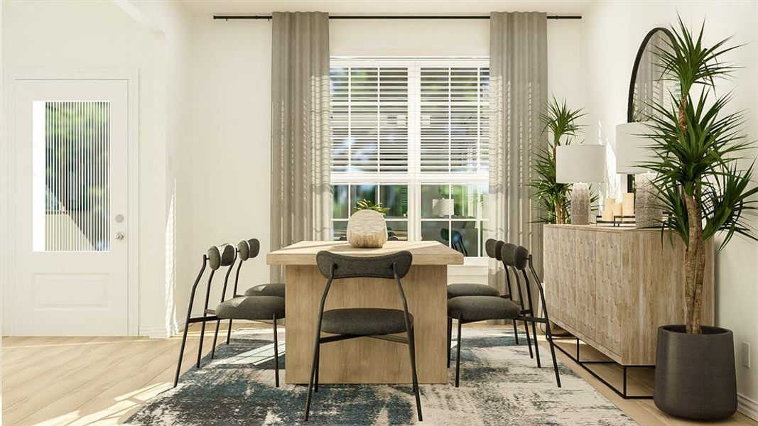 Dining space with light wood-type flooring