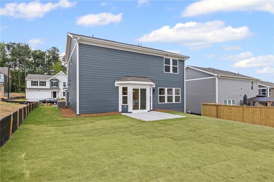 Front exterior of a new home in Sage Woods, Dallas, GA, highlighting curb appeal (Image 22).