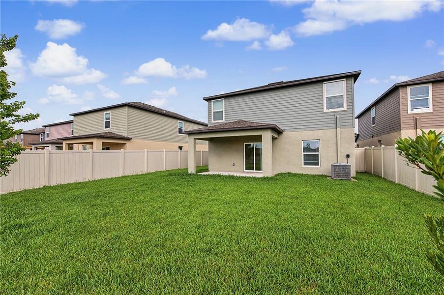 Exterior details and patio area of a home in Park East, Plant City (Image 25).