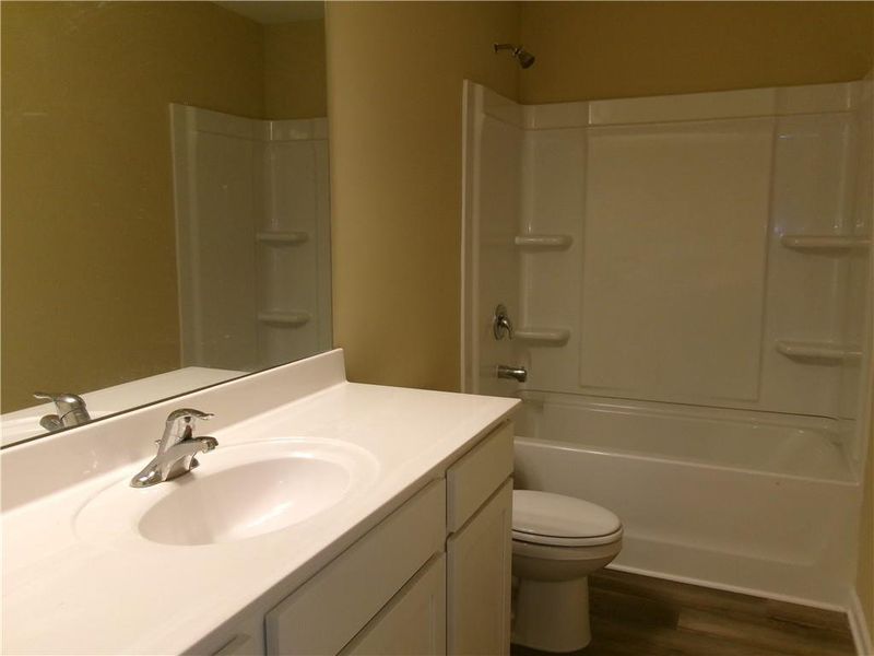 Furnished interior view inside a new home in Alder Park, Conyers (Image 4).
