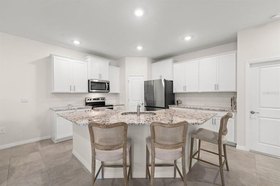 Furnished interior view inside a new home in Star Farms at Lakewood Ranch, Bradenton (Image 6).