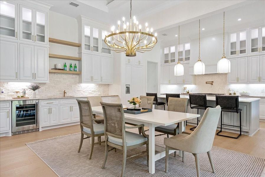 Double crown molding and elevated trim details bring architectural depth to the main living spaces without sacrificing the relaxed comfort of everyday life.