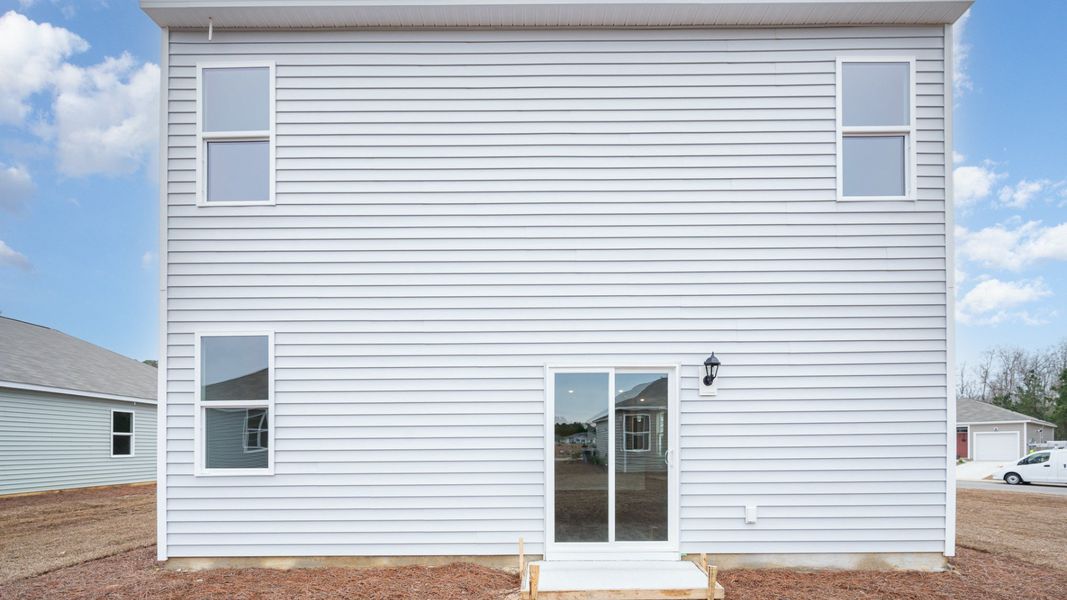 Exterior details and patio area of a home in Saltgrass Landing, Winnabow (Image 2).