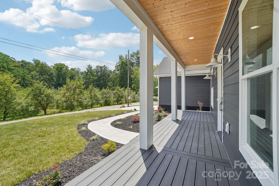 Front exterior of a new home in , Hendersonville, NC, highlighting curb appeal (Image 1).