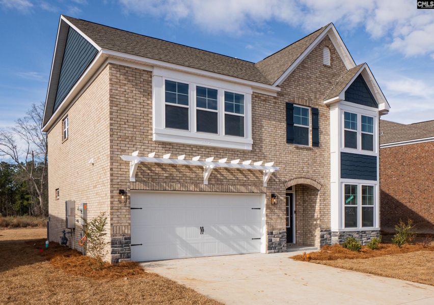 Front exterior of a new home in Beach Forest, Sumter, SC, highlighting curb appeal (Image 17).