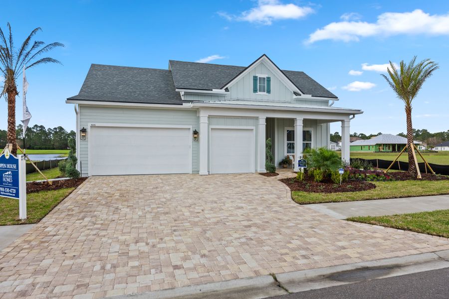 Front exterior of a new home in Amelia National Country Club, Fernandina Beach, FL, highlighting curb appeal (Image 24).