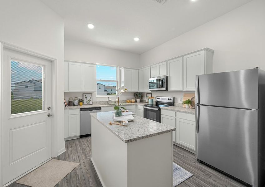 The spacious kitchen is perfect for preparing your family's favorite meals and treats.