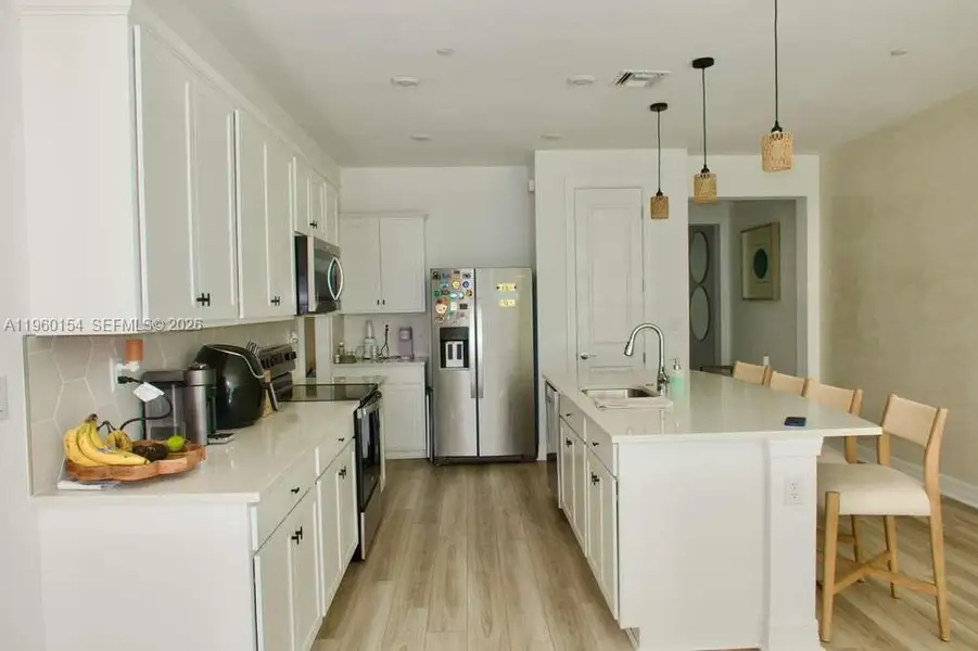 Furnished interior view inside a new home in , Plantation (Image 6).
