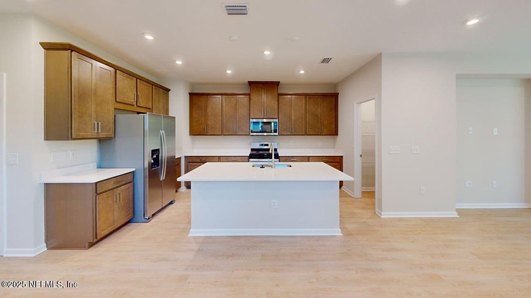 Furnished interior view inside a new home in RiverTown - Forest, St. Johns (Image 3).